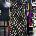 “Elegant vintage black dress with beige polka dot print. Classic and feminine Photo 4
