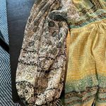 Free People COPY -  long sleeve blouse in a shear material size medium. GUC. Photo 2