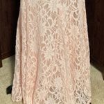 Floor length shimmery formal dress. Low cut back Size undefined Photo 1