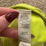 Athleta  neon yellow mini tennis skirt size M Photo 6