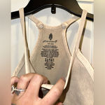 Free People Movement NWOT  Happiness Runs Crop Tank In Stone Eagle Size: Xs/S $30 MSRP No outside logo No refunds or cancellations Photo 6