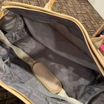 Amazon Cream and tan Sony carry-on bag #travel Photo 3