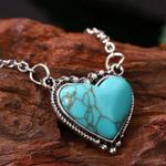 Cute cowgirl/western style silver chain with cute turquoise heart center… Photo 1