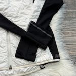 New Balance  Women’s Polartec Hooded Black and White Jacket Photo 3