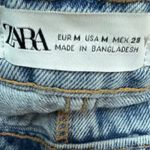 ZARA  Denim Mini Skirt Medium M‎ Light Wash Distressed Ripped Raw Hem Womens Photo 5
