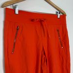 Athleta Trekkie North Jogger Pants – Bright Orange – Size 10 Photo 4