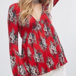 Free People red floral boho bell sleeve top Photo 0