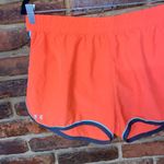 Under Armour Neon Coral Orange Activewear Athletic Shorts Women's Size XL Photo 1