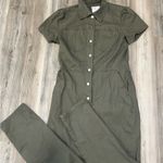 Khaki green jumpsuit with button Photo 4