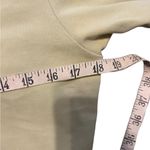 Nike ESSENTIAL SHORT SLEEVES CROP
YELLOW shirt size large Photo 3