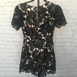 The Impeccable Pig Floral Black Lace Romper Photo 1