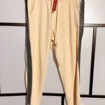 Guess active fashion paved logo shinny pants Beige Soft sweatpants jumpsuit Photo 1
