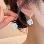 Elegant Gold and White Floral Earrings Photo 0