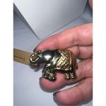 Vintage Gold Tone Elephant with Rhinestone Eye Brooch Photo 6