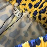 Yellow and purple leopard shirt Size undefined Photo 1