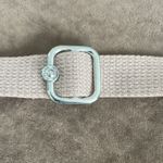 Kipling crossbody purse. Adjustable strap. Flap over closure w/ snap. Light pink Photo 2