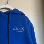White Fox Boutique  Hoodie Sz S/M in Blue Cursive Photo 1