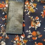 Xxi Essentials sleeveless ladies blouse is a size small P. Photo 4