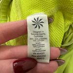 Athleta  neon yellow mini tennis skirt size M Photo 5