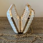 Elegant White Woven Clutch with Gold Chain Photo 3