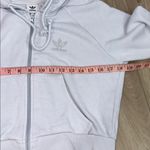 Adidas  cropped light blue rhinestone hoodie size small Photo 5