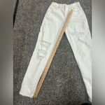 American Eagle Womenโs Size 0R White Skinny Jeans Distressed Ripped Knees Photo 1