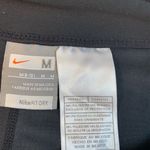 Nike  crop flare leggings. Size Medium Photo 3