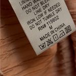 All in Favor size medium mid length dress. Zips up the back. Faux buttons. Lined Photo 7