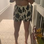 These Three Boutique Cow Printed Denim Shorts Photo 6