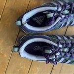 Adidas  Women's Kanadia TR 6 trail running shoes in black and purple.  Photo 1