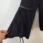 Ro & De XS black flowy blouse with sleeve detail and tie closure Photo 3