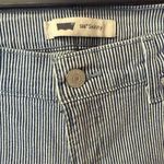 Levi's  524 Ultra Low Rise Skinny Leg Jeans with a blue and white striped pattern Photo 1