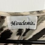 MiracleSuit 𝅺 cover up size small. Photo 1