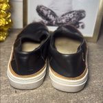 Toms  Women's Black Slip-On Shoes Photo 2