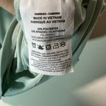 Nike Womens Dri-FIT One Luxe Twist Front Short Sleeve Top Athletic Mint Green 1X Photo 3