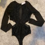 Black Cut Out Bodysuit Size M Photo 1