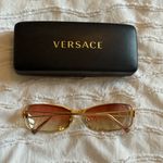Versace | Medusa Sunglasses with Gold Frame and Pink Lenses Photo 1