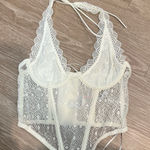 Out From Under  Top Photo 0