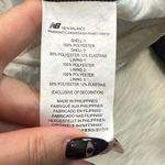 New Balance  Women’s Polartec Hooded Black and White Jacket Photo 8