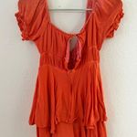 Boutique Orange Romper Photo 1