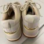 ALDO  Vany gold and white tennis shoes women’s size 7.5 in great shape Photo 2