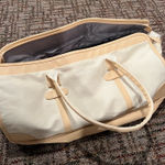 Amazon Cream and tan Sony carry-on bag #travel Photo 0