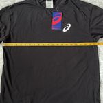 ASICS  Women’s Meshed Short sleeve performance tee in black size Large Photo 7