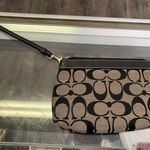 Coach Stylish Black and Tan Women's Wristlet Bag Photo 2