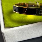 Tory Burch NWOT Black and Gold Hinged Bracelet Photo 2