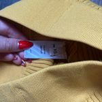 Cult Gaia  Gold Ribbed Pants Photo 3