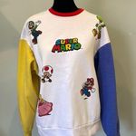 Nintendo super Mario Red and Yellow Crewneck Sweatshirt Photo 0