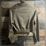 NVGTN STRETCHY ZIP CROP TOP Photo 6