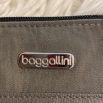 Baggallini Baggalini Shoulder Bag BNWOT color gray adjustable stripe lots of zippers Photo 1