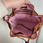 Dooney & Bourke  Pebble Grain Drawstring Hobo Bucket Bag Brown Pink Interior Photo 5